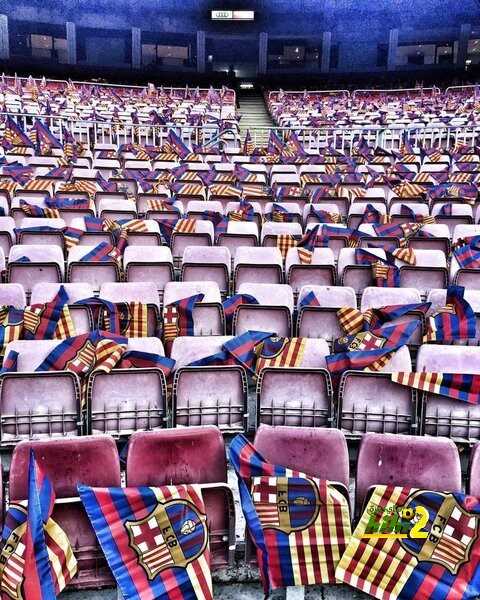 صورة..مقاعد كامب نو تتزين بأعلام برشلونة قبل الكلاسيكو